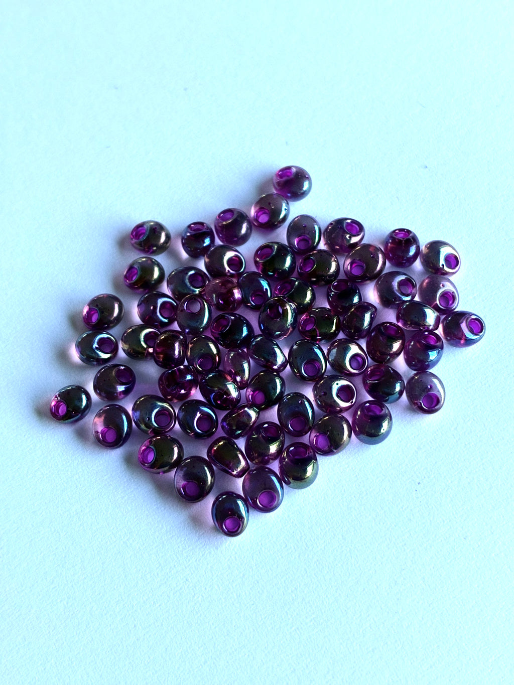 21701. Magatama glass beads 4mm.