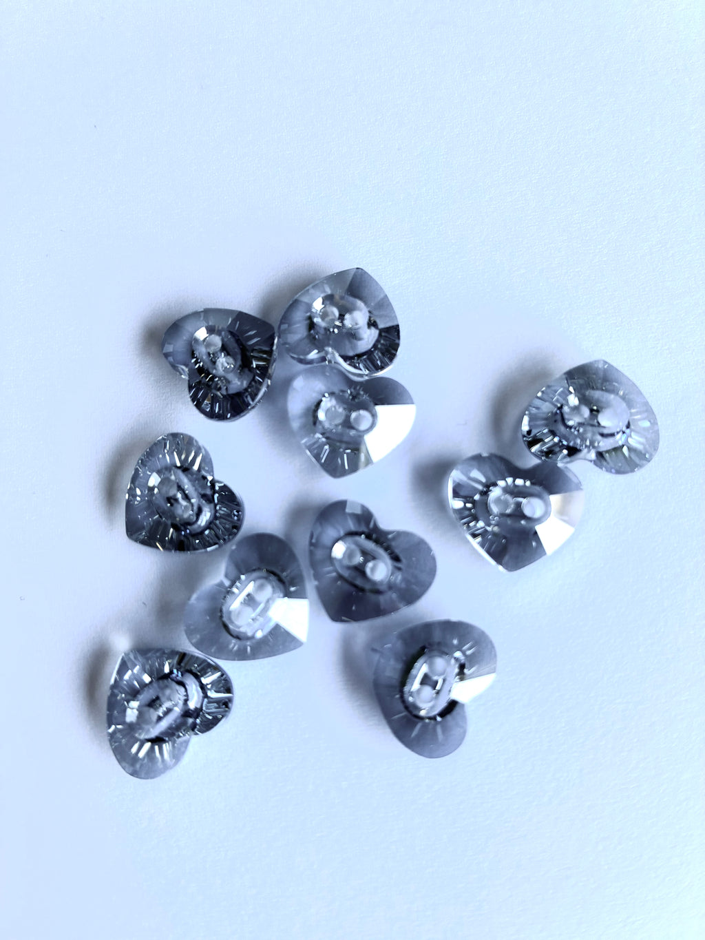30235. Heart shaped button 12x14mm.