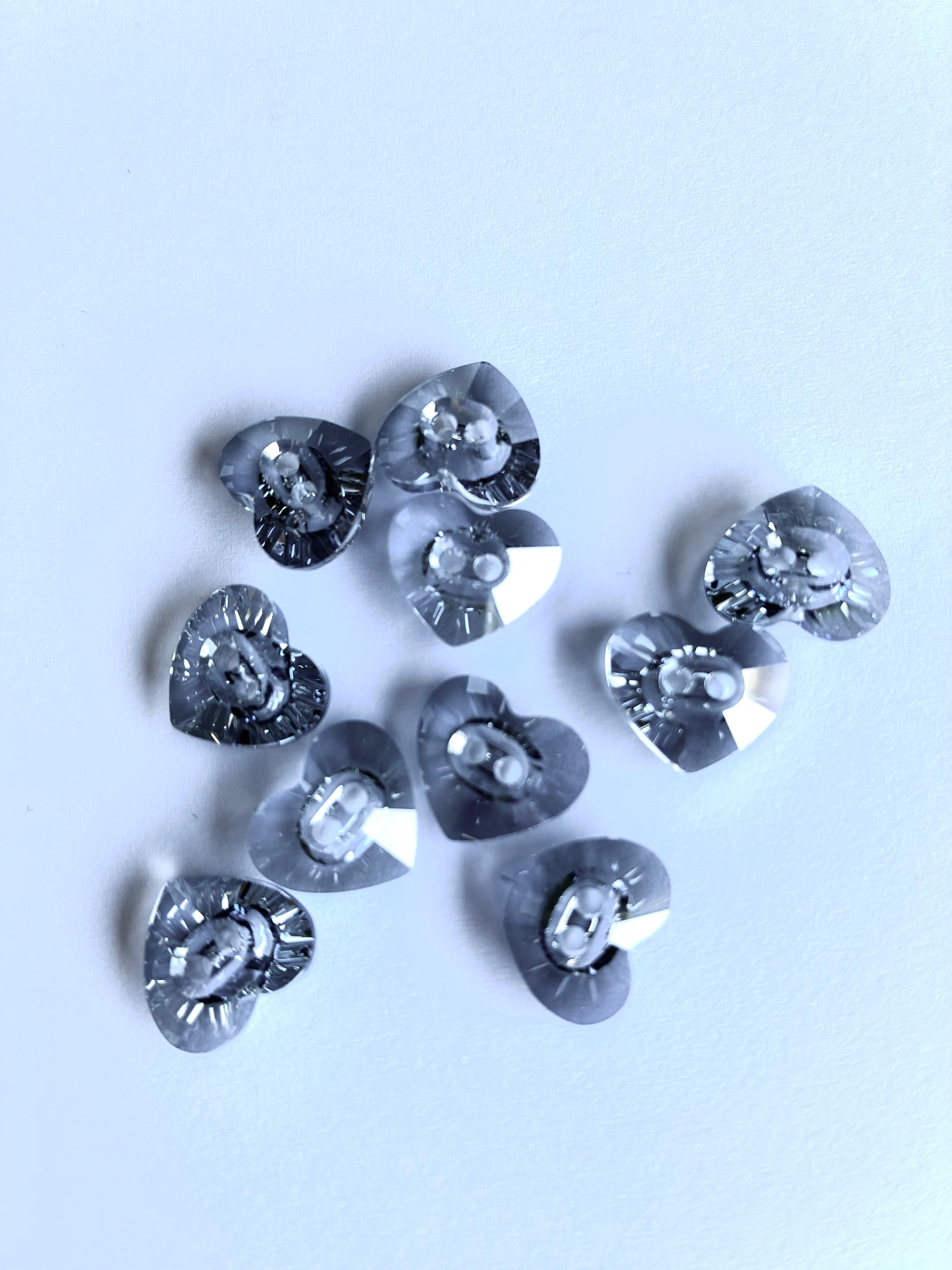 30235. Heart shaped button 12x14mm.