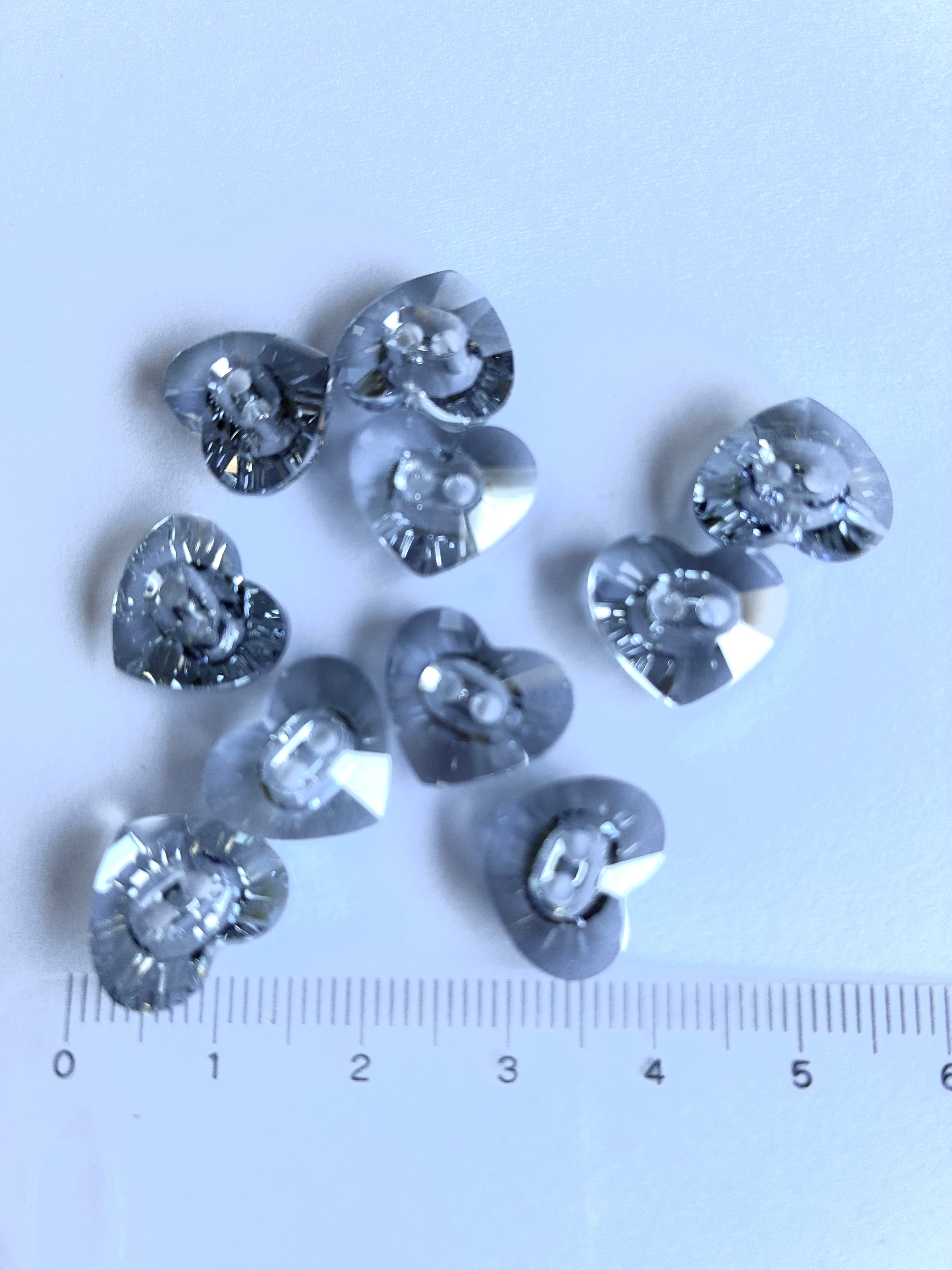 30235. Heart shaped button 12x14mm.