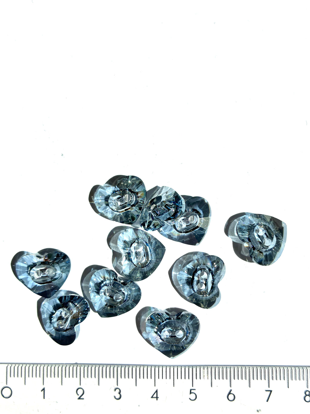 30235. Heart shaped button 12x14mm.