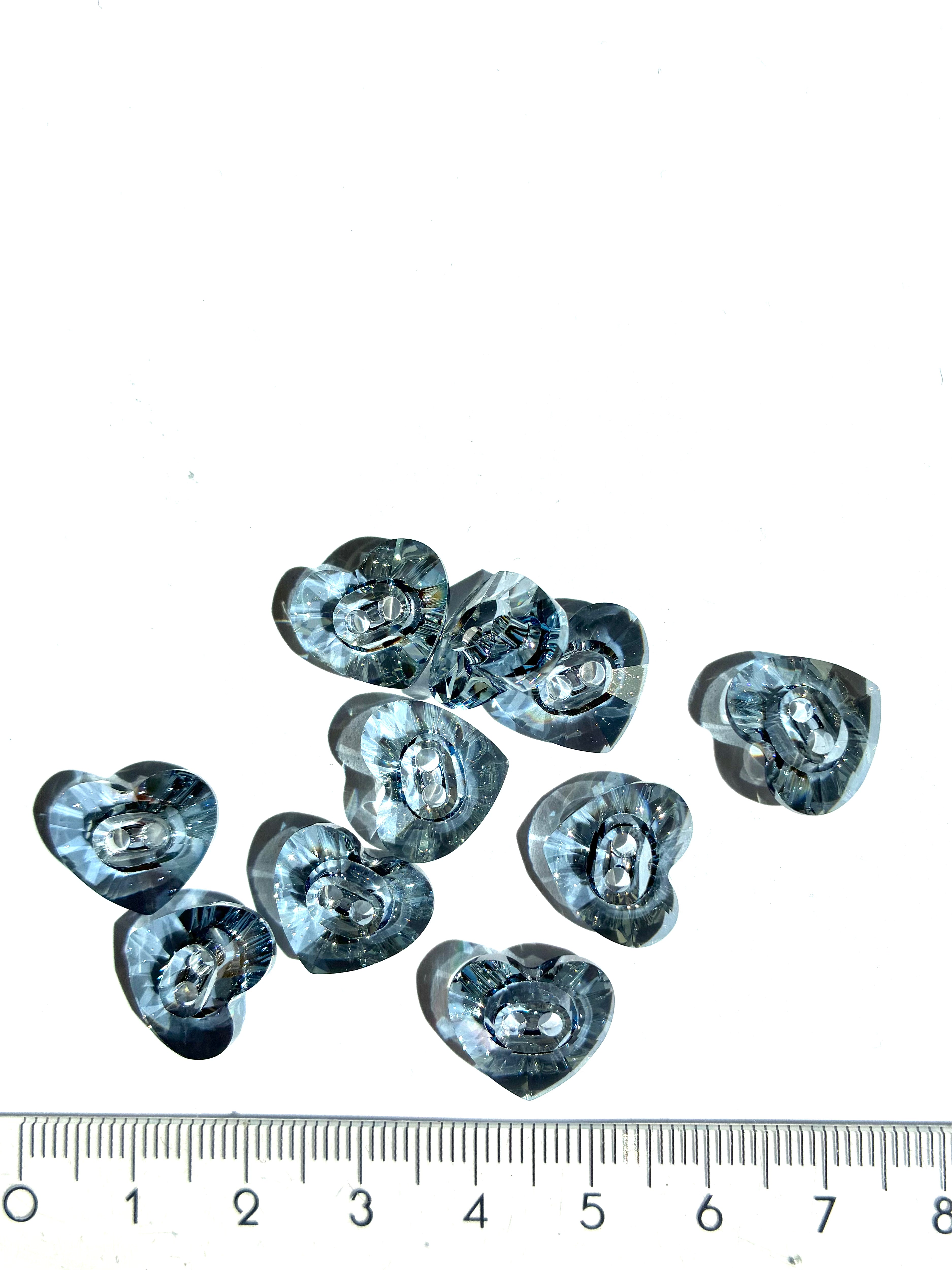 30235. Heart shaped button 12x14mm.