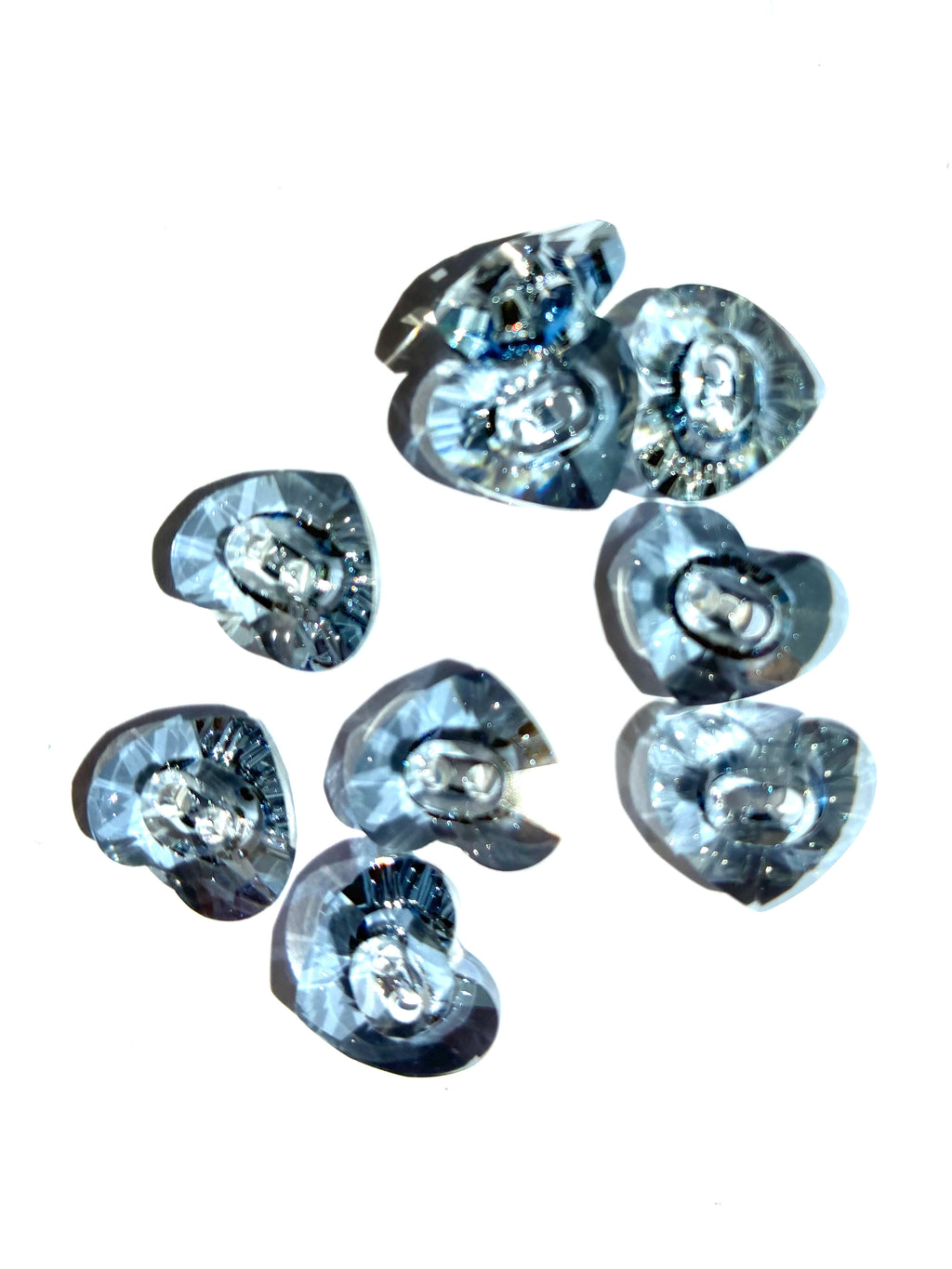 30235. Heart shaped button 12x14mm.