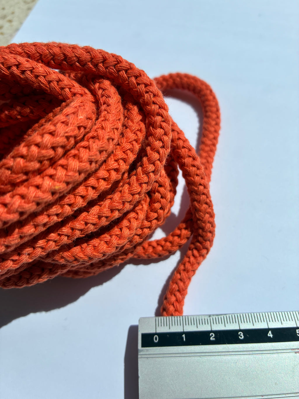1033ACC. Weaved cord. 8mm. Orange.