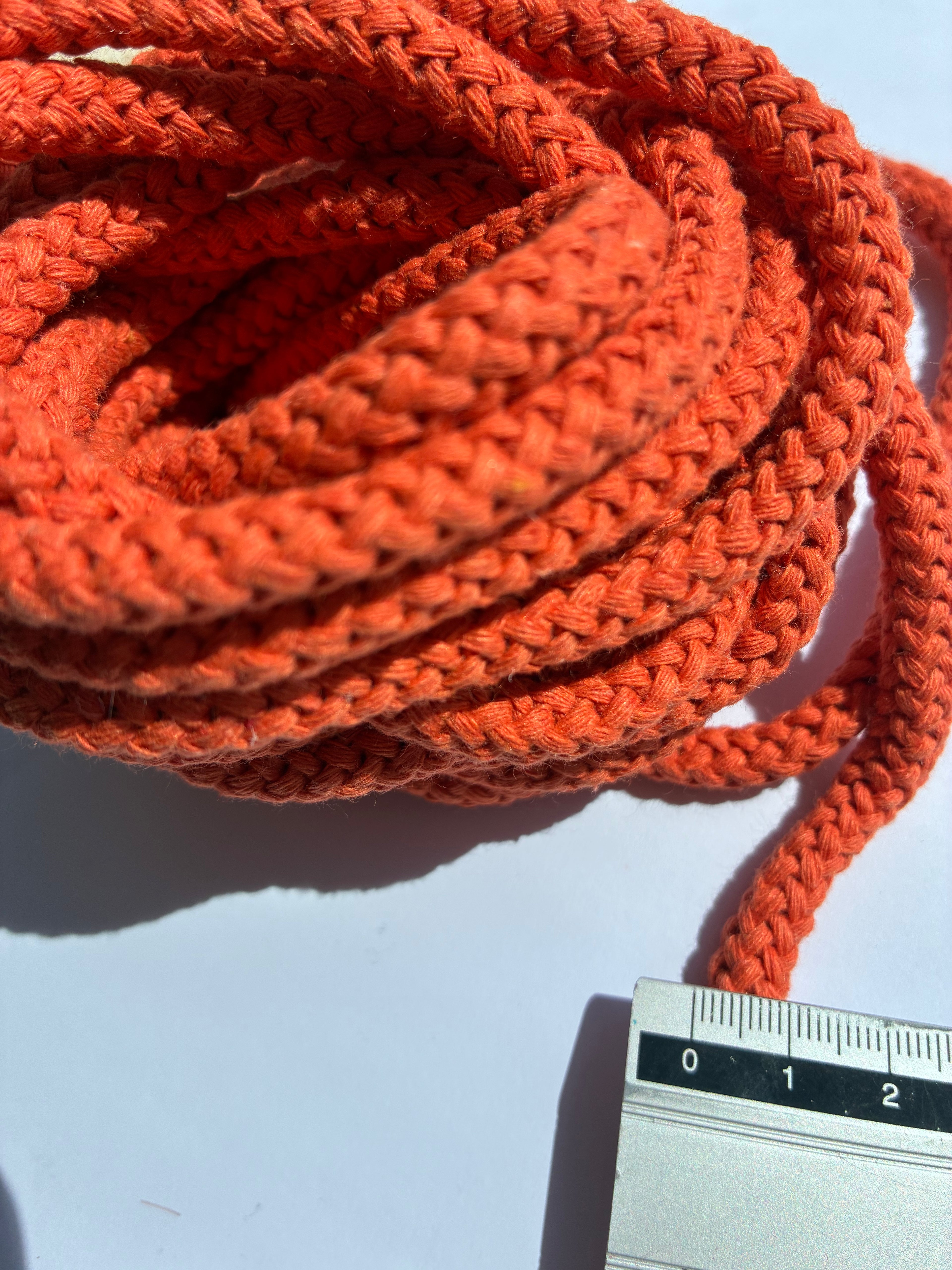 1033ACC. Weaved cord. 8mm. Orange.